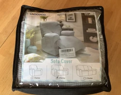 This is a new slip cover for a 2 recliner couch .