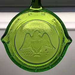 Small Green Glass Patriotic Eagle Frying Pan. This is a nice pre-owned decorative piece. There appears to be a small...