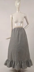 FASHIONED OF A WONDERFUL SEERSUCKER LINEN THAT IS GREY AND WHITE STRIPED WITH SINGLE BONE BUTTON CLOSING THE WAISTBAND....