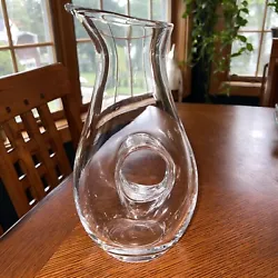This Original piece features a clear color with no visible signs of wear or tear. The decanter is perfect for serving...