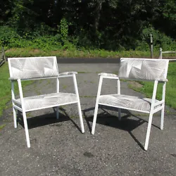 Pair 90s patio chairs by Brad Jobe for Bespoke, New York.  The pair feature painted steel frames with Sunbrella...
