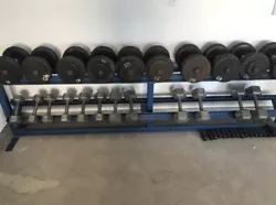 dumbell set with rack. 10 pounds set up to 65 pounds set