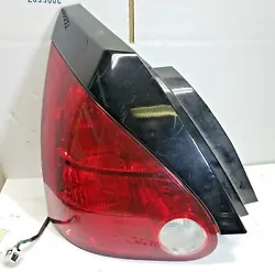                        2004 2008 NISSAN MAXIMA LEFT TAIL LIGHT BLACK OEM  USED IN GREAT TESTED CONDITION...