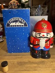 Nutcracker Toy Soldier cookie Jar Musical. This is a cookie jar that stands approximately 12 inches tall. When you take...