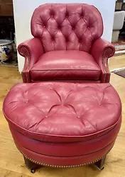 Classic Hancock & Moore signed leather nailhead reading chair with matching ottoman. An iconic, antique leather cigar...