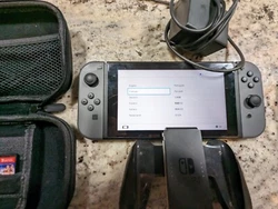 Nintendo switch console used (adult owned).  Comes with pro controller, and games as pictured.  Case included,...