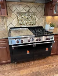 Vintage Wolf Range 48 With Double Oven, Griddle, and Marble Cover.