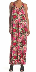 This printed racerback maxi dress offers the understated allure youre looking for come summer time. V-neck. Sleeveless....