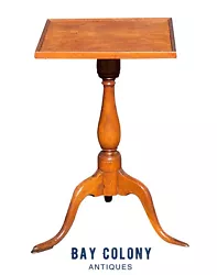 The stand has a two board top with a very minimal separation and the base has been reinforced with old iron brackets....
