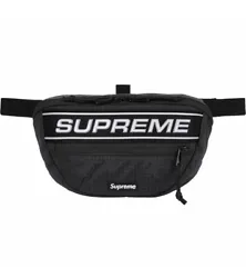 This Supreme Waist Bag in Black FW23 is the perfect accessory for any stylish man on the go. With its sleek design and...