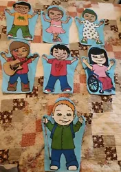 Children With Disabilities Puppets. Set of 7 puppets made of thin cloth, one with a small tear but otherwise good...