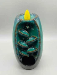 Premium ceramic backflow incense burner. Incense smoke flows downward for a magical effect that appears to pour down...