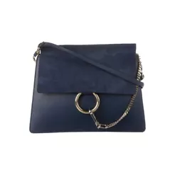 The Chloé Faye Shoulder Bag is a must-have for any womans wardrobe, with its chic Parisian style and Classic design....