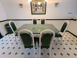 Verdi Green Kitchen Table with 6 chairs. Table in great shape.