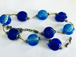 Up for sale, I have an antique Bohemian pressed textured glass beaded necklace that is made in two blue colors. It is...
