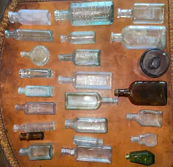 The bottles are perfect for display or adding a touch of history to any room. This lot is a rare find, and each bottle...