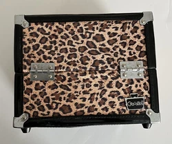 This is a Caboodles makeup case with a leopard print design.