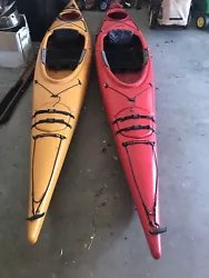 CURRENT DESIGNS KESTREL 140 OC ROTO KAYAK 13FT-6IN/SPEC. Red kayak has roto. Both kayaks need new hatch covers. Yellow...