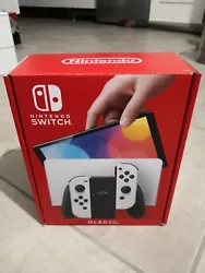 Nintendo Switch OLED (blanche). Il sagit du dernier model de Nintendo Switch avec un écran Oled plus large et plus...