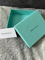 Authentic Tiffany & Co. Jewelry Box With Care Tag. This box is good sized as noted in the pictures. No dents, interior...