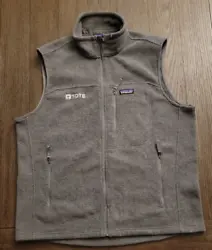 Vest is pre-owned and in good condition.