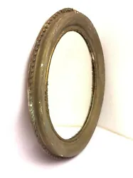 The mirror shows wear including missing molding, scratches, discoloration, and signs of age; the mirror has a...