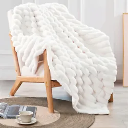 Faux Fur & Micromink Blanket: This 100% polyester blanket is suitable for a couch, chair, or bed; take it outside or...
