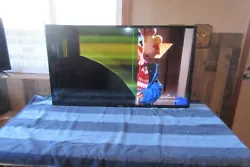 Tv powers up, with sound and reception. Screen only. Cracked Screen.