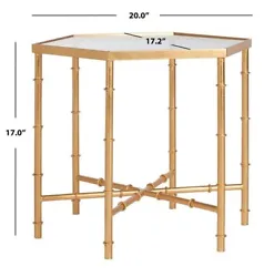 Safaviehs Open Box Furniture. The updated Asian elegance of the Kerri Accent Table’s faux bamboo blends classic...