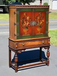 Antique Elizabethan Walnut China Cabinet with Painted Facade c. 1920 having great painted doors with floral bouquets....