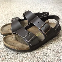 In good pre-owned condition with some wear such as dark spots on footbed, few discolored spots on front side of...