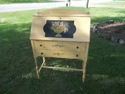 Pretty yellow w/ hand painted flowers all around. 42