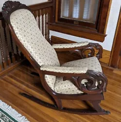 Classic Antique Victorian Lincoln Rocker, upholstered fabric. Wood is in very good condition, fabric on the seat, back...