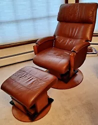 vintage AvantGlide glider reclining leather chair with matching leather ottoman. In color brown cognac. Mid century...
