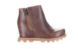 Take on wet weather with confidence in this waterproof bootie lifted by a hidden wedge and grounded by a grippy rubber...