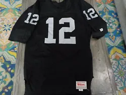 OAKLAND RAIDERS KENNY STABLER SIGNED WILSON VINTAGE JERSEY SIZE 46. The signature is badly faded but the jersey is a...
