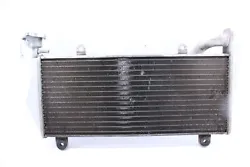 Removed From: ducati with miles. This radiator is in good condition and shows normal signs of wear.