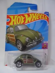 Up for sale is a stunning 2021 Hot Wheels Volkswagen Beetle Woodie Woody Compact Kings 42/250 L9 diecast car. This rare...
