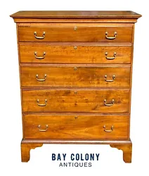 This semi tall chest has 5 graduated drawers and a well-defined cornice. The top of the chest showcases a series of...