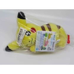 This Pikachu plush, who is laying on his belly and winking playfully at his trainer, was a Japan-Only Toreba prize...
