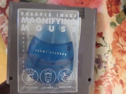 Letter Opener, Magnifier and Paper Stand. Sharper Image Magnifying Mouse. This is a Mini Mouse.