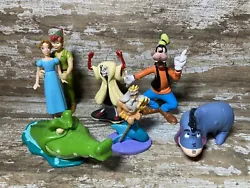 Disney classic figures perfect to display for the Disney lover. I believe some of these are actually cake toppers from...