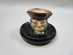 This Royal Doulton toby figure is on a 3&5/8 round base.  Its height is approximately 2&3/4 inches.  It is in good...