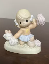This adorable Precious Moments figurine, titled 