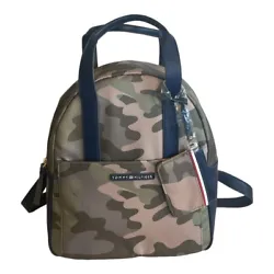 This Tommy Hilfiger backpack in green camouflage pattern is perfect for travel and casual occasions. With a medium size...