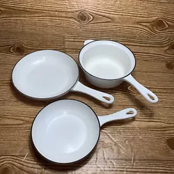 Le Creuset White Cast Iron Enameled Pans. IncludesSauce Pan #18 Fry Pan 7” Fry Pan 8”All are in good condition