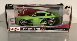 Maisto Premiere DC 2011 Ford Mustang GT Fuelie Wheels 1/24 Scale Die-Cast 2013. Items is new with box damage