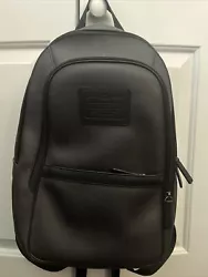 Coach Men’s Leather & Canvas Backpack.