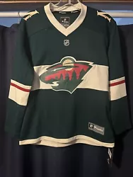 NHL Minnesota Wild #7 Hockey Jersey New Youth Size L/XL. New with tags Has a little mark on the number 7