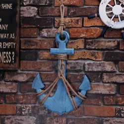 Add a touch of nautical chic with this wooden anchor decor. Anchor mimics weathered wood in a blue finish with light...
